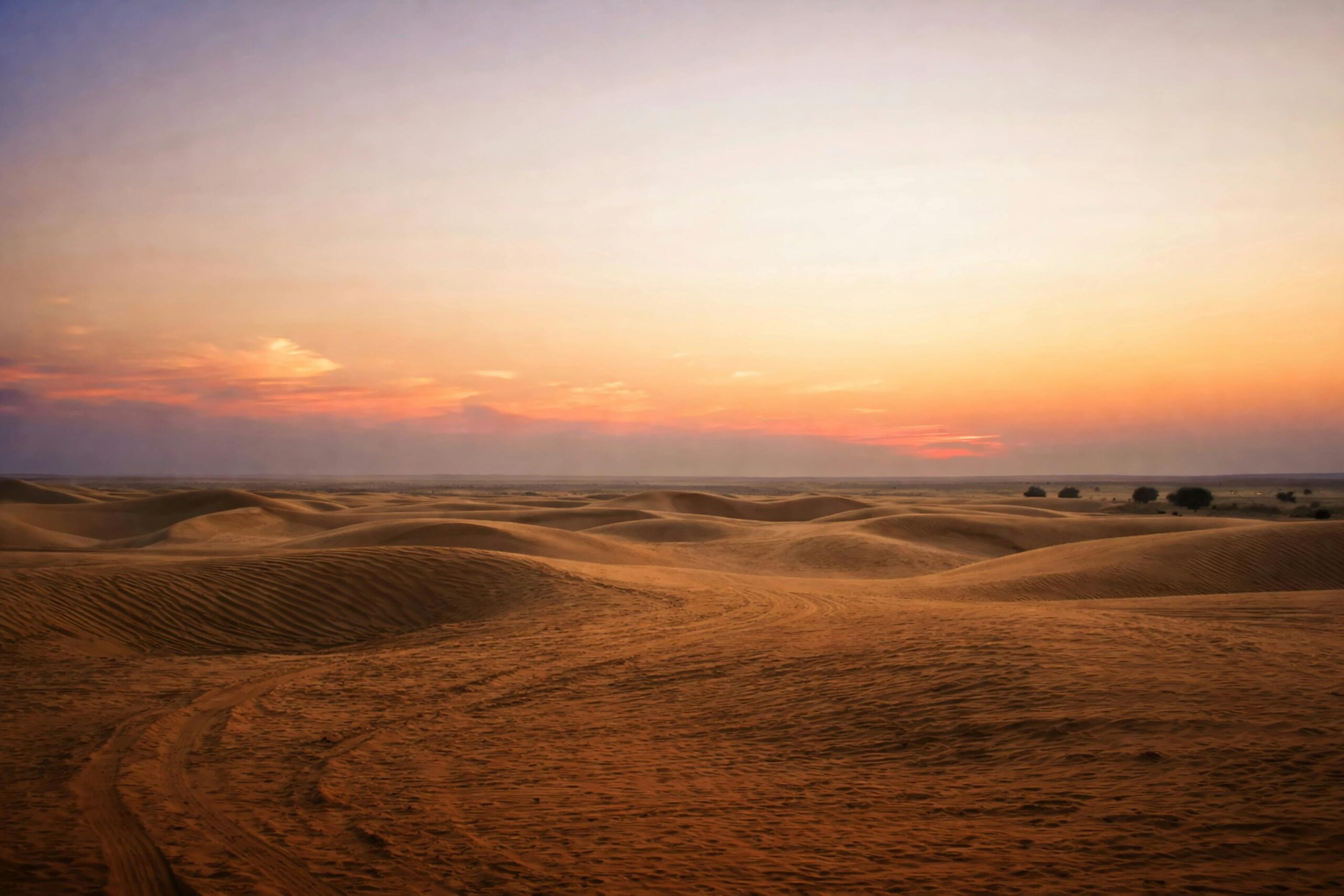 Stunning sunset over the dunes of Thar Desert in Jaisalmer, Rajasthan.
