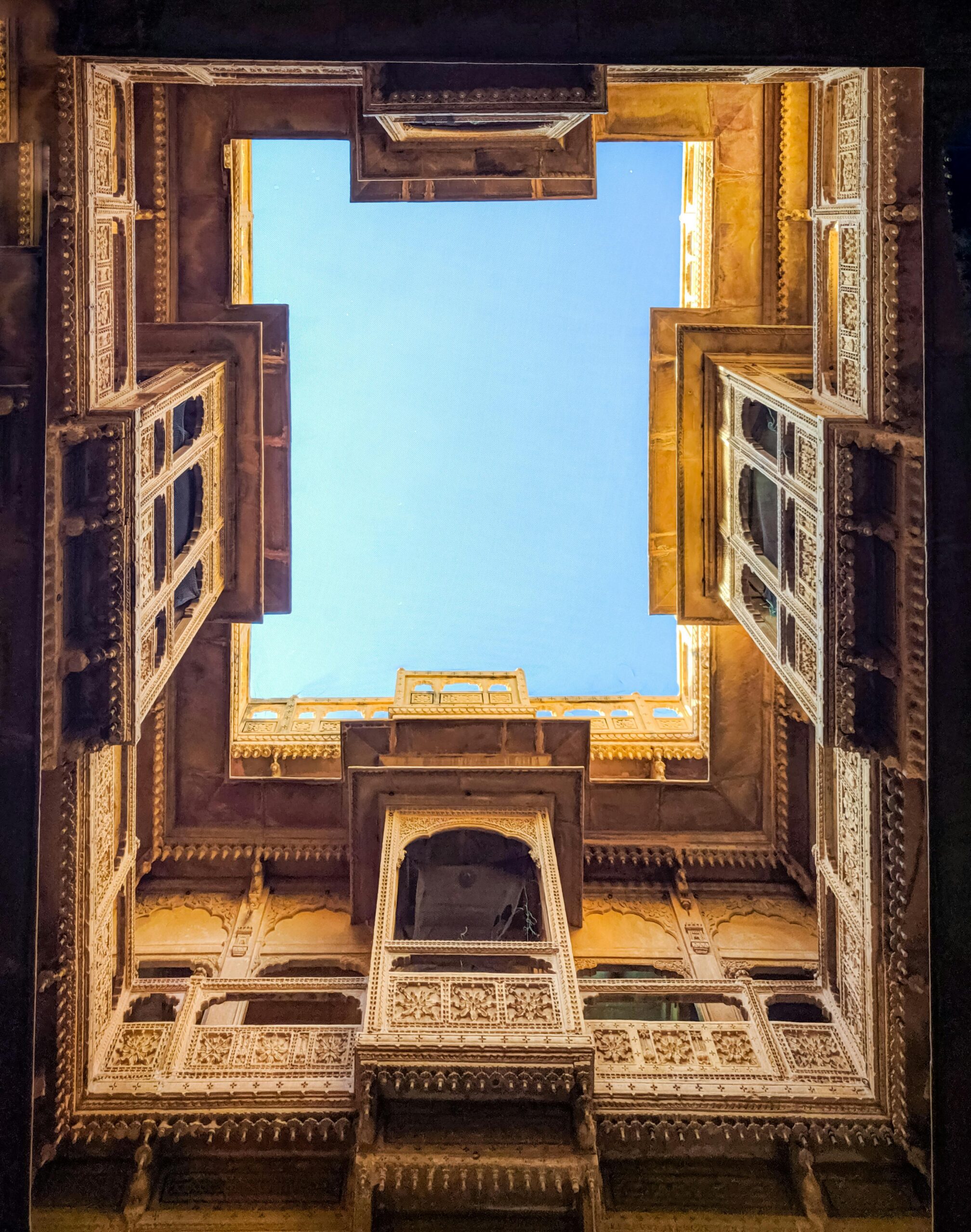 Beautiful view of the ornate architectural structures within Jaisalmer Fort, Rajasthan, India.